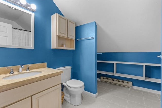 1750 Fish Creek Falls Rd, Steamboat Springs, CO 80487 - bathroom featuring a baseboard radiator, toilet, vanity, tile patterned floors, and lofted ceiling