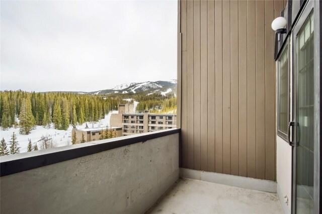 631 Village Rd Unit 36450, Breckenridge, CO 80424 - snow covered back of property with a mountain view