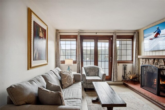 631 Village Rd Unit 36450, Breckenridge, CO 80424 - living area with tile patterned floors and a fireplace