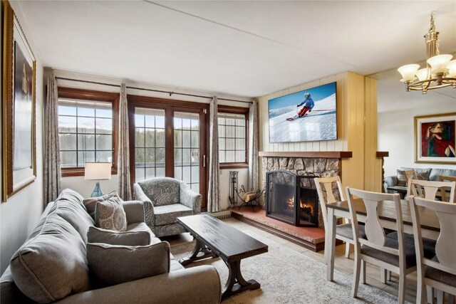 631 Village Rd Unit 36450, Breckenridge, CO 80424 - living area with a stone fireplace and a chandelier