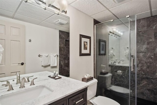 631 Village Rd Unit 36450, Breckenridge, CO 80424 - bathroom featuring visible vents, vanity, a shower stall, and toilet
