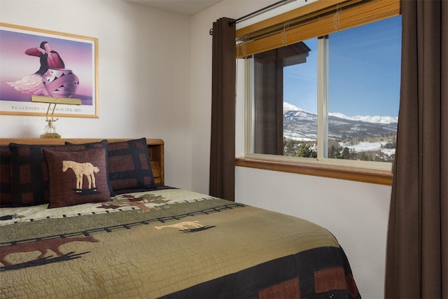 bedroom with a mountain view