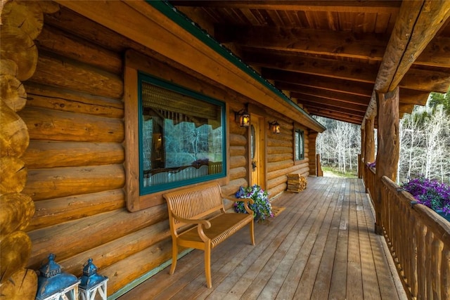 24110 Arapahoe Rd, Oak Creek, CO 80467 - wooden deck with covered porch
