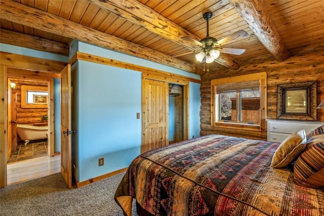 24110 Arapahoe Rd, Oak Creek, CO 80467 - bedroom featuring wooden ceiling, beam ceiling, rustic walls, and carpet floors