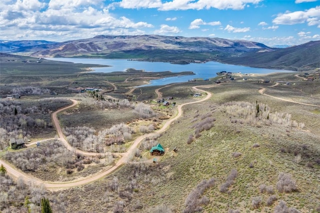24110 Arapahoe Rd, Oak Creek, CO 80467 - drone / aerial view featuring a water and mountain view