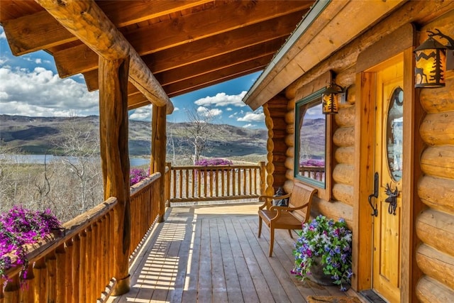 24110 Arapahoe Rd, Oak Creek, CO 80467 - wooden deck with a mountain view