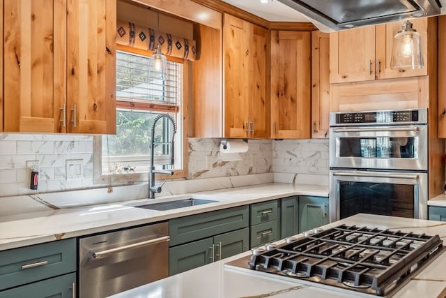 112 Grey Squirrel Ln, Breckenridge, CO 80424 - kitchen with appliances with stainless steel finishes, a sink, light countertops, and green cabinetry