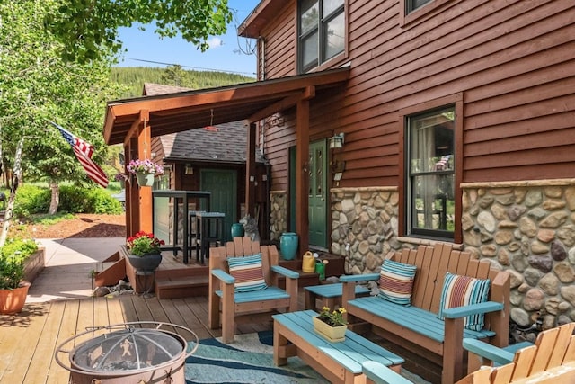 112 Grey Squirrel Ln, Breckenridge, CO 80424 - wooden terrace with a fire pit