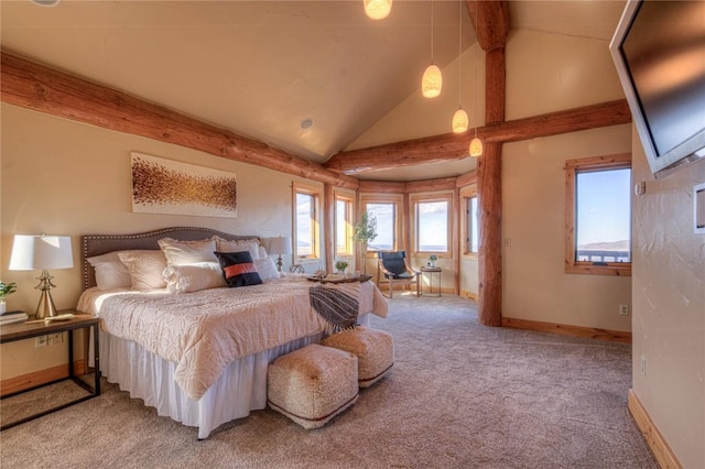 1390 Mountain Valley Rd, La Veta, CO 81055 - bedroom with lofted ceiling with beams, light carpet, and baseboards