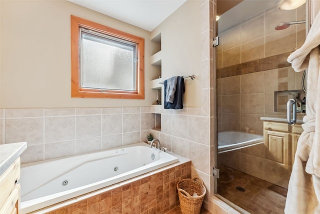 960 Whispering Pines Ln, Breckenridge, CO 80424 - full bath with vanity, a jetted tub, and a shower stall