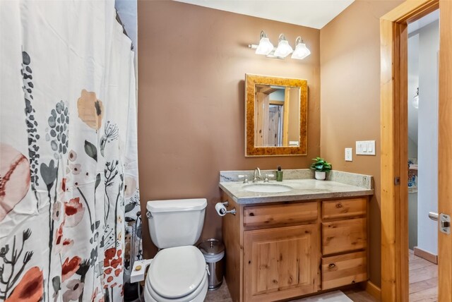 960 Whispering Pines Ln, Breckenridge, CO 80424 - bathroom with a shower with shower curtain, toilet, and vanity