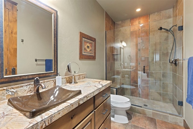 210 Game Trail Rd, Silverthorne, CO 80498 - bathroom featuring vanity, toilet, a shower stall, and recessed lighting