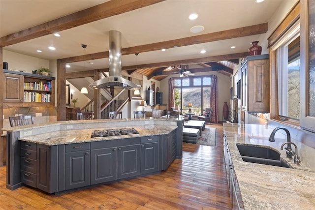 210 Game Trail Rd, Silverthorne, CO 80498 - kitchen with recessed lighting, beam ceiling, and a sink