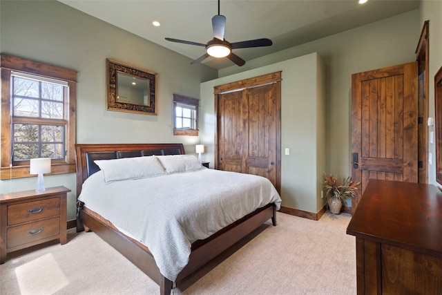 210 Game Trail Rd, Silverthorne, CO 80498 - bedroom featuring baseboards, multiple windows, ceiling fan, and light colored carpet
