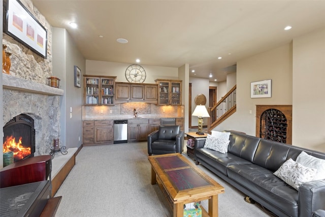 210 Game Trail Rd, Silverthorne, CO 80498 - living area with bar area, recessed lighting, stairway, light carpet, and a fireplace