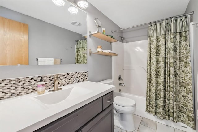 2981 Abbey Rd, Steamboat Springs, CO 80487 - bathroom featuring decorative backsplash, vanity, shower / bath combo with shower curtain, and tile patterned floors