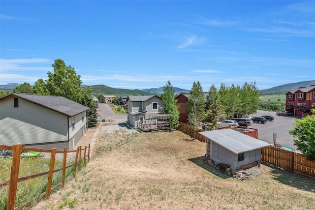 2981 Abbey Rd, Steamboat Springs, CO 80487 - fenced backyard featuring a mountain view and a shed