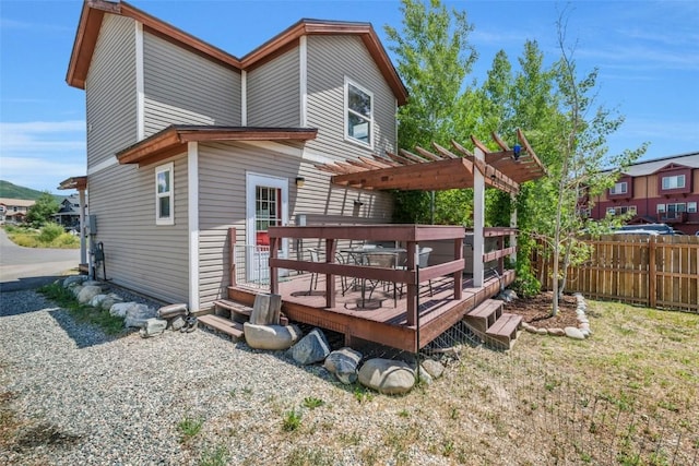 2981 Abbey Rd, Steamboat Springs, CO 80487 - rear view of house with a pergola and a wooden deck