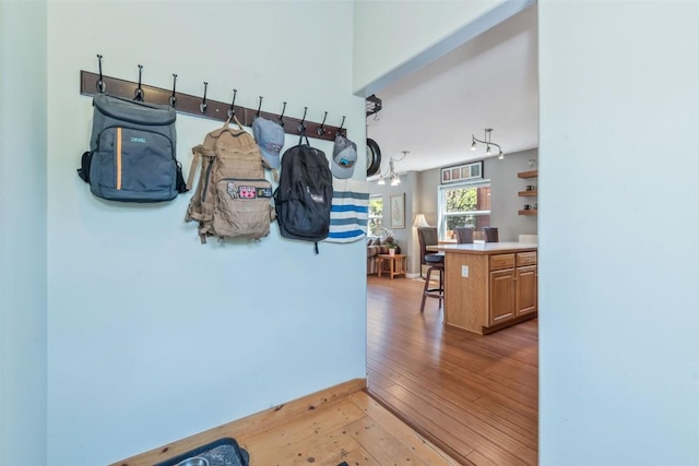 2981 Abbey Rd, Steamboat Springs, CO 80487 - corridor featuring light wood-style flooring and a chandelier