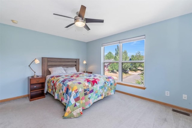 2981 Abbey Rd, Steamboat Springs, CO 80487 - carpeted bedroom with baseboards and a ceiling fan