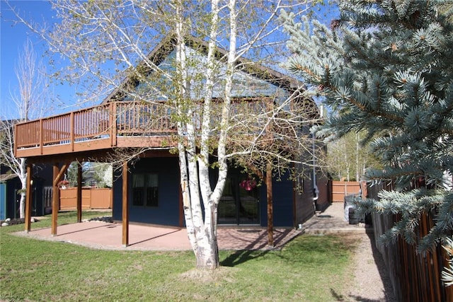 27426 Brandon Cir, Steamboat Springs, CO 80487 - rear view of house with a deck and a patio area