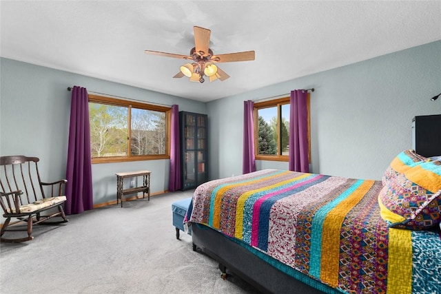 27426 Brandon Cir, Steamboat Springs, CO 80487 - carpeted bedroom featuring ceiling fan