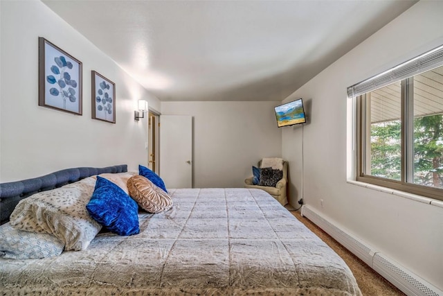 370 E Ln Bonte St Unit A, Dillon, CO 80435 - bedroom with a baseboard heating unit and baseboards