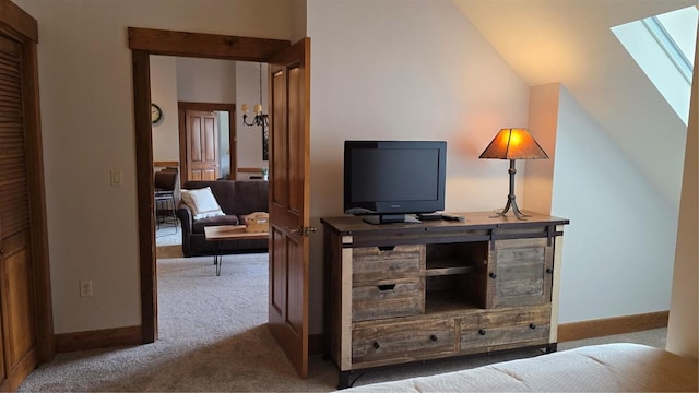 53 Hunki Dori Ct Unit 8905, Keystone, CO 80435 - living area with carpet flooring, vaulted ceiling, and a skylight
