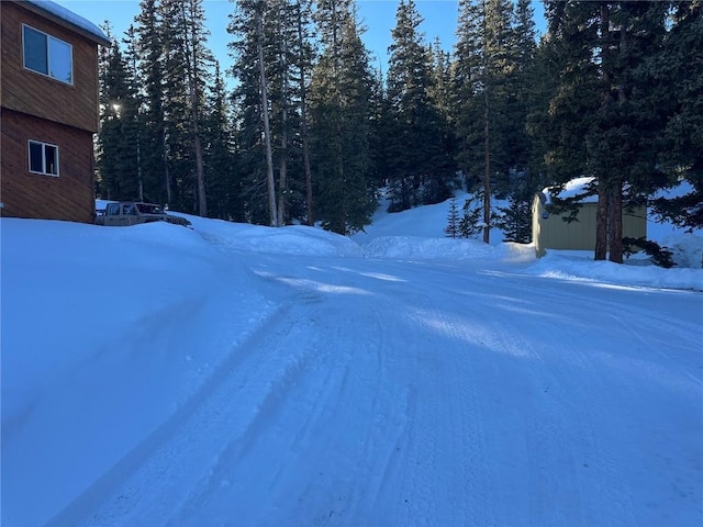 view of yard layered in snow