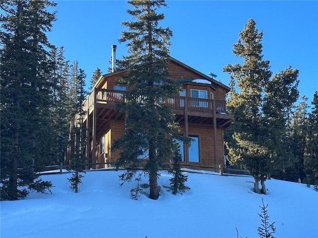 exterior space featuring a wooden deck