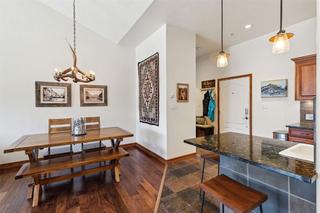 101 E Main St Unit 301, Frisco, CO 80443 - dining space with a chandelier, baseboards, recessed lighting, and dark wood-style floors
