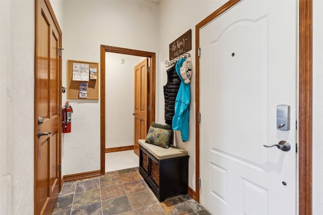 101 E Main St Unit 301, Frisco, CO 80443 - mudroom featuring baseboards and stone finish flooring