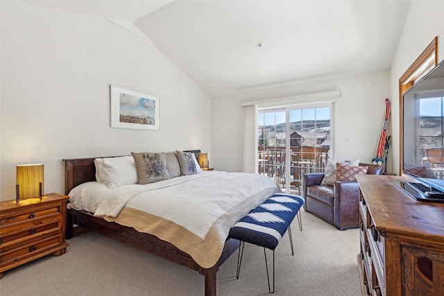101 E Main St Unit 301, Frisco, CO 80443 - bedroom with light colored carpet, multiple windows, vaulted ceiling, and access to outside