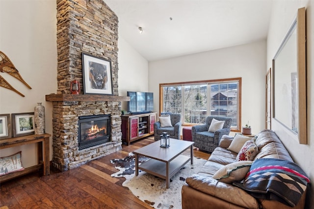 101 E Main St Unit 301, Frisco, CO 80443 - living area with hardwood / wood-style floors, a fireplace, and high vaulted ceiling