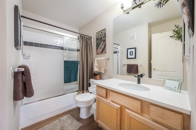 1399 Morgan Ct Unit 704, Steamboat Springs, CO 80487 - full bath with wood finished floors, toilet, shower / tub combo, and vanity