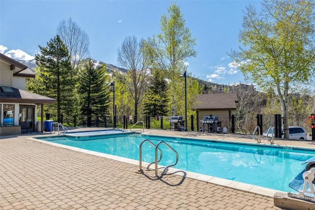 1655 Ranch Rd Unit 403, Steamboat Springs, CO 80487 - community pool featuring area for grilling, a patio area, and a mountain view
