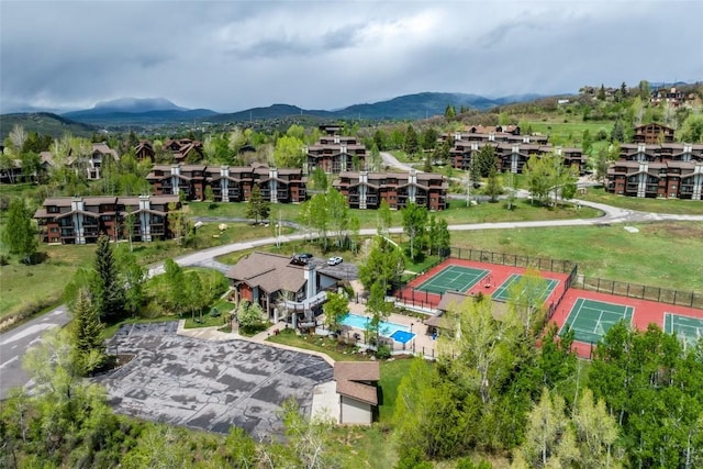 1655 Ranch Rd Unit 403, Steamboat Springs, CO 80487 - bird's eye view of a mountain backdrop and a pool