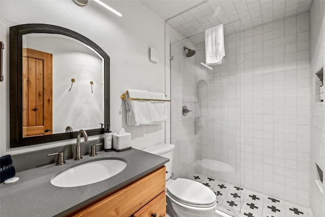 1655 Ranch Rd Unit 403, Steamboat Springs, CO 80487 - full bathroom with toilet, a tile shower, and vanity