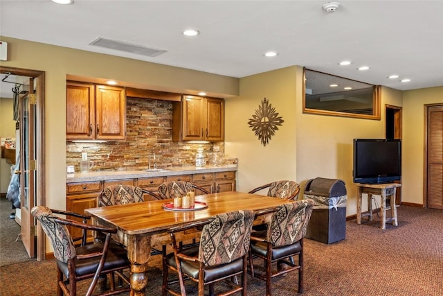 1655 Ranch Rd Unit 403, Steamboat Springs, CO 80487 - dining room featuring dark carpet, recessed lighting, and baseboards