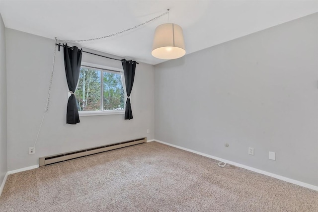 6 Sequoia Ct Unit 6, Steamboat Springs, CO 80487 - carpeted empty room with a baseboard heating unit and baseboards