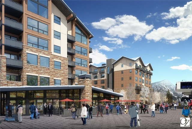 75 Hunki Dori Ct Unit E407, Keystone, CO 80435 - view of apartment building / complex with a mountain view