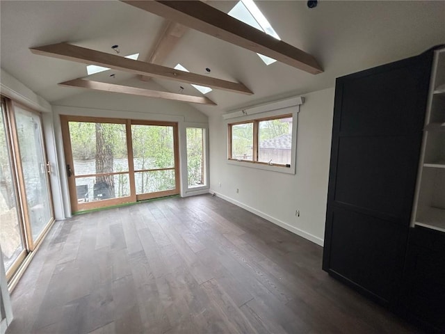 1325 Dream Island Plz Unit 18, Steamboat Springs, CO 80487 - spare room with a skylight, baseboards, and wood finished floors