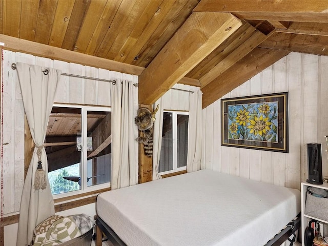 bedroom with lofted ceiling, wooden ceiling, and wooden walls