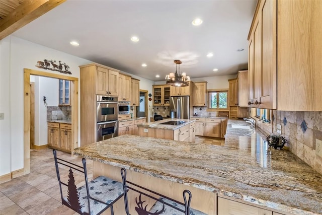 70 County Road 26, Twin Lakes, CO 81251 - kitchen featuring light brown cabinets, tasteful backsplash, stainless steel appliances, and recessed lighting