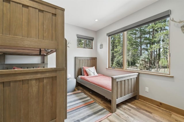 212 Cucumber Creek Rd, Breckenridge, CO 80424 - bedroom featuring wood finished floors and baseboards