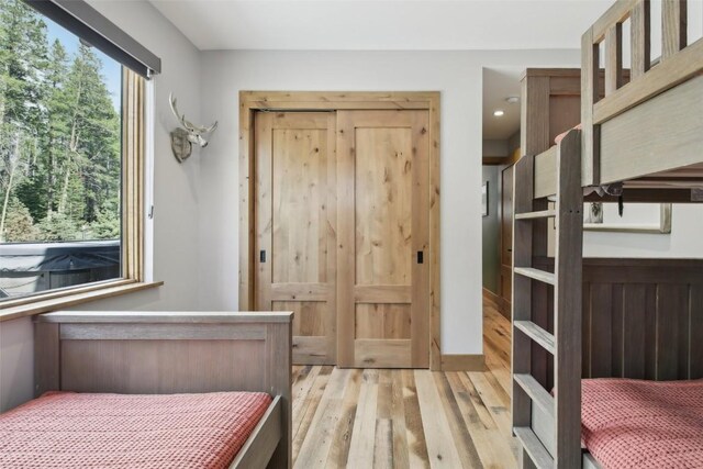 212 Cucumber Creek Rd, Breckenridge, CO 80424 - bedroom featuring light wood-style floors and recessed lighting
