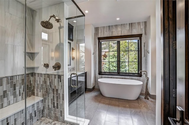 77 E Trade Ct, Keystone, CO 80435 - full bath featuring a stall shower, a freestanding bath, and recessed lighting