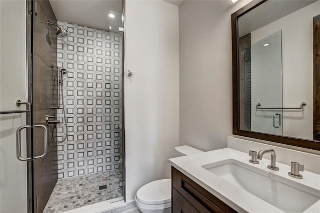 77 E Trade Ct, Keystone, CO 80435 - bathroom featuring a stall shower, vanity, and toilet
