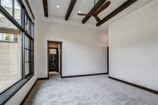 77 E Trade Ct, Keystone, CO 80435 - spare room with beam ceiling, carpet flooring, ceiling fan, baseboards, and recessed lighting