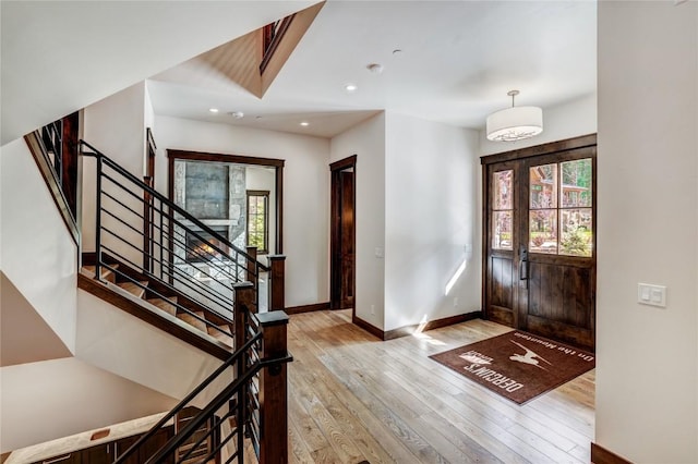 77 E Trade Ct, Keystone, CO 80435 - entryway featuring light wood finished floors, stairway, baseboards, and recessed lighting